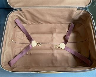 Louis Vuitton suitcase                                                                  23"h x 16"w x 7.75"d  interior strap is detached