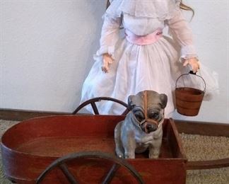 Antique porcelain doll, Ceramic dog with muzzle, darling 2 wheel cart