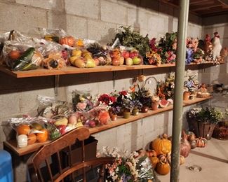 Lots of wax, paper mache vegetables and fruits, lots of faux floral decor