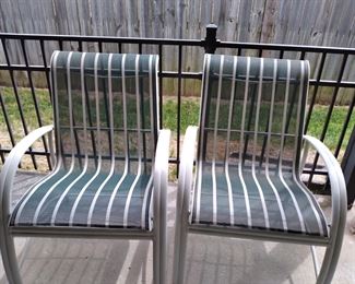 Set of metal and web patio chairs