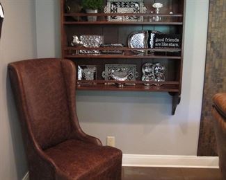 One of a set of four leather chairs