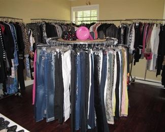 We have set up a designer boutique room filled with beautiful designer clothing, shoes and purses.