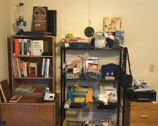 Office bookcase, file cabinet, supplies, gadgets, books