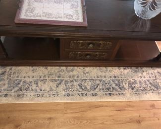 Coffee table with sliding door