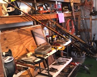 Several long and short rods and reels, cane poles.