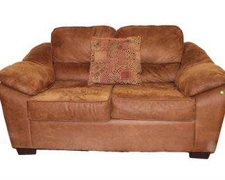 
Lot 526
Nice suede leather style loveseat with pillow by Hughes Furniture Inc.
