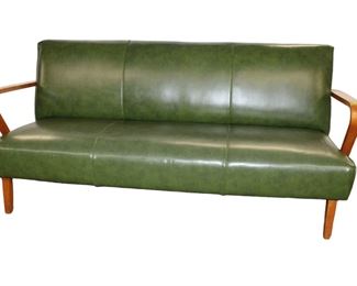 
Lot 527
Mid century modern green leather bent arm sofa attribute to Heywood Wakefield
