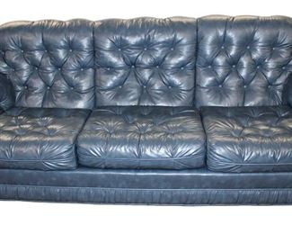 
Lot 540
Vintage blue leather style button tuft sofa by Bench Craft
