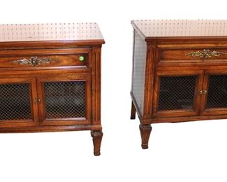 
Lot 552
Pair of White Furniture Company wire front 1 drawer 2 door walnut nightstands
