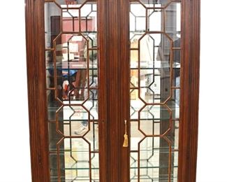 
Lot 555
Beautiful Harden 2 door mirror back mahogany display curio with pierced carved top and glass shelves
