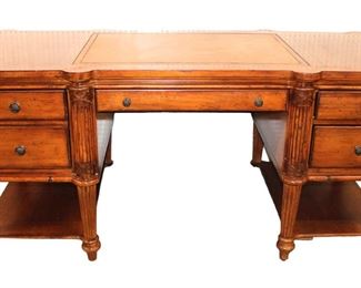 
Lot 559
Nice Tommy Bahama executive desk with leather top
