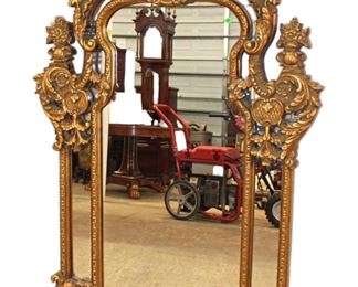 
Lot 613
Heavily carved and ornate Italian style decorator mirror
