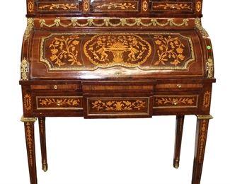 
Lot 632
Nice French style inlaid cylinder roll desk with applied bronze

