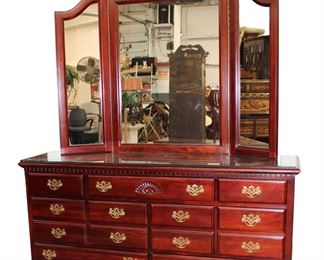 
Lot 634
Traditional shell carved mahogany dresser with tri fold mirror
