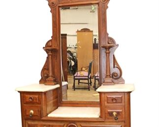 
Lot 651
Antique Victorian marble top drop center dresser with mirror
