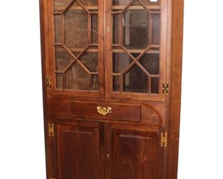 
Lot 658
Quality Suters Reproductions Harrisburg Virginia solid walnut 1 drawer 4 door corner cabinet with key and individual pane glass
