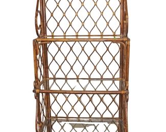 
Lot 665
Nice Vintage decorator bamboo frame glass shelf bakers rack
