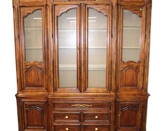 
Lot 670
Vintage Drexel Heritage walnut and oak 2pc china cabinet
