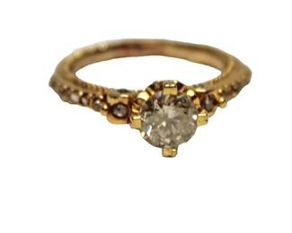 
Lot 684
IGI certified 1.03ct diamond and .15ct accent diamonds in 14K yellow gold ring approx. size 7

