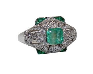 
Lot 687
1.18ct emerald and diamonds 14K yellow gold ring approx. size 7
