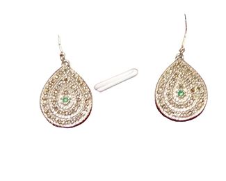 
Lot 692
Diamonds and emerald sterling silver earrings
