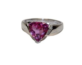 
Lot 695
Trillion cut pink topaz and diamond 10K white gold ring approx. size 7
