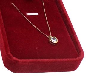 
Lot 701
14K yellow gold with aquamarine pendant charm necklace approx. 18"
