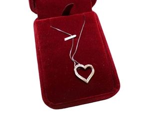 
Lot 703
.22ct diamond and rose gold over sterling pendant charm necklace
