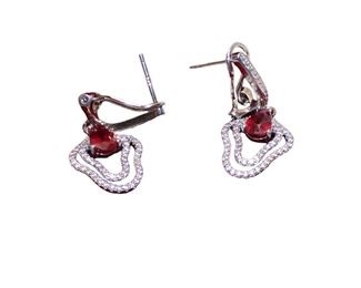 
Lot 708
1.7ct Mozambique rubies and .4ct white sapphire sterling earrings
