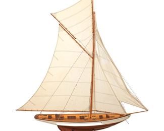 
Lot 710
Hand carved model of a sail boat on stand

