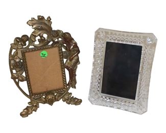 
Lot 715
2 picture frames, (1) antique style brass (1) glass
