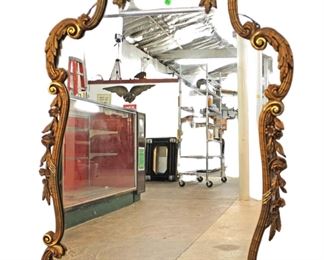 
Lot 764
Semi antique French style highly carved and ornate decorator mirror
