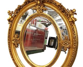 
Lot 763
Beautiful gold gild composition bevel glass decorator mirror
