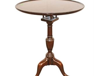 
Lot 769
Kittinger solid mahogany tilt top table
