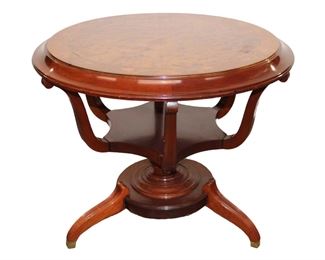 
Lot 770
Vintage mahogany lamp table with burl walnut accents
