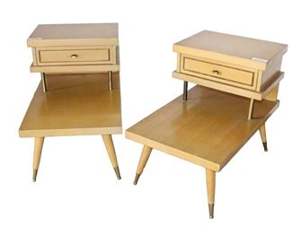 
Lot 796
Pair of vintage mid century step up end tables in the blonde finish

