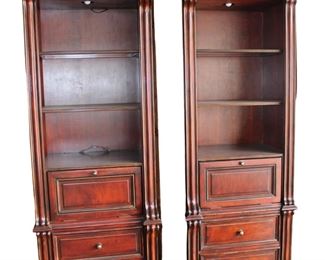 
Lot 799
Pair of mahogany lighted bookcase
