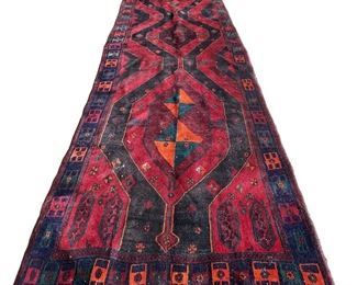 
Lot 825
Semi antique hand stitched 5' x 12.5' wool rug

