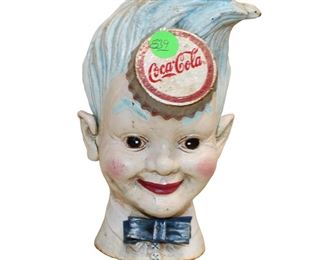 
Lot 839
Vintage Cast Iron Coca Cola "Sprite Boy"
