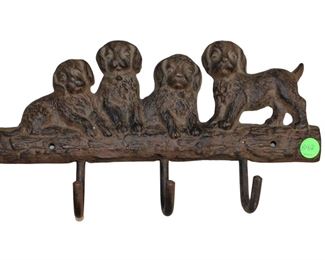 
Lot 842
Cast Iron puppies hook rack
