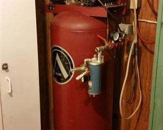 Acme 80 gallon  2 cylinder compressor powered by a 230 volt 5 hp motor.