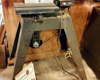 Craftsman sander has 6 in. x 48 in. belt and 9 in. disc.  Includes 3 extra belts and an assortment of discs.