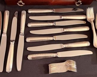 Partial set of Chrisofle “Malmaison” sterling flatware