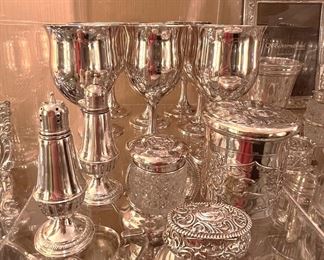 Set of (8) sterling goblets, sterling salt and peppers, sterling and sterling and crystal containers