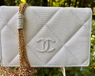 Vintage Chanel snakeskin flap handbag with multi-chain strap