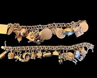 (2) Vintge 14k gold charm bracelets. Note: both bracelets are 14k, but one has a few gold filled charms