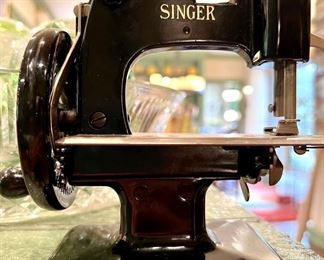 Miniature Singer sewing machine…it works!