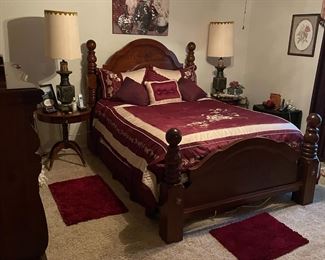 Bassett Queen bedroom set: Bed box spring and mattress, chest of drawers, dresser with mirrored hutch curio.                $550.00