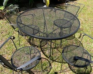 Black Wrought Iron table with 4 chairs.  36" Diameter          $250.00    