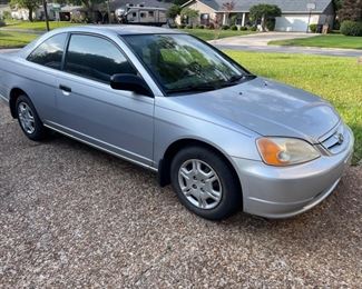 2001 Honda Civic Coupe, 101 k miles.       Automatic very good condition make a great 1st car, graduation or birthday present.    $ 2,500.00